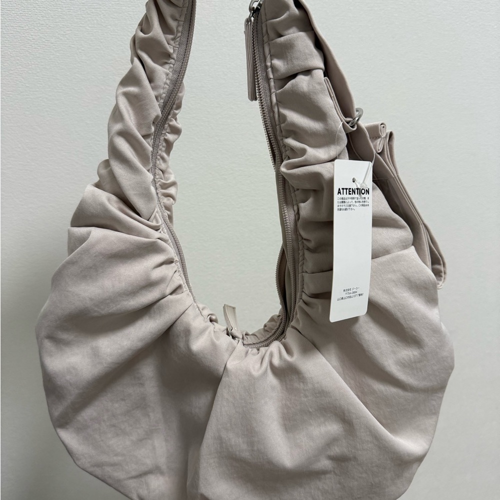 GU Japan Fabric Dumpling Bag in Natural Color